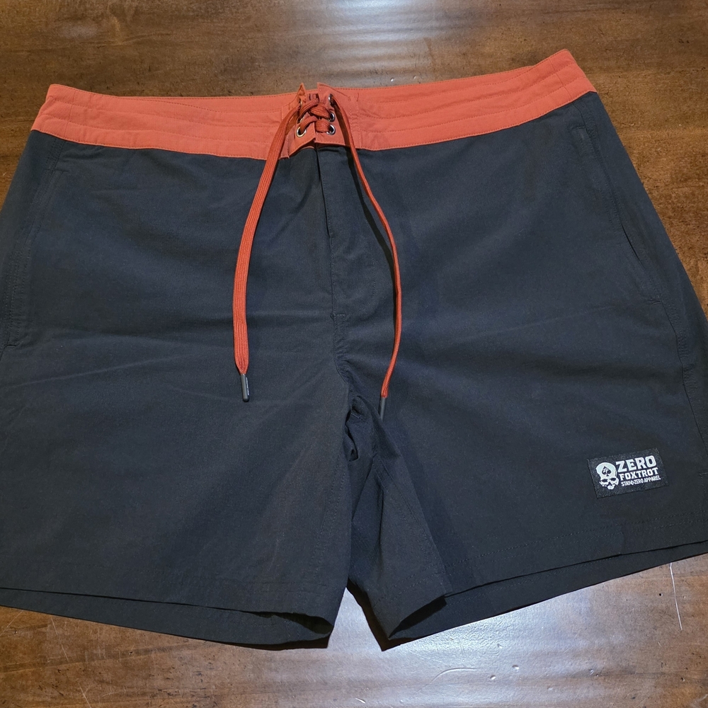 Zero Foxtrot Men's Black Swim Board Shorts with Orange Waistband
